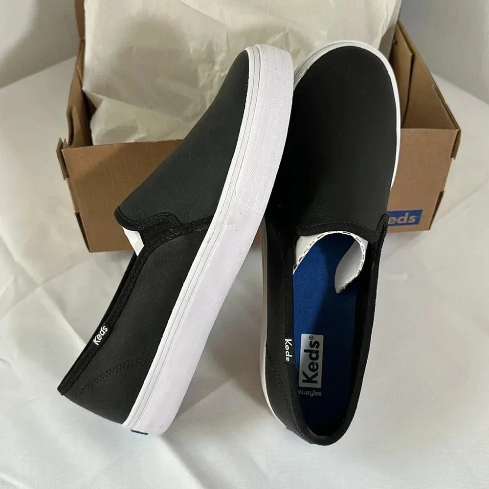 NWT Keds Softerra slip ons black with white sole size 8.5 in excellent condition